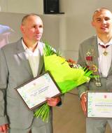 Олександр Хижняк та його тренер і батько Олександр Хижняк-старший.