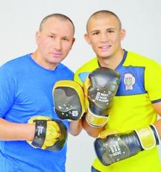 Олександр Хижняк (праворуч) і його батько та тренер — Олександр Хижняк-старший.
